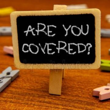 Upside down clothes pin with sign attached, "are you covered?"